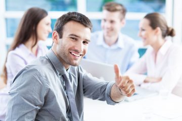 20360345 - businessman showing thumbs up